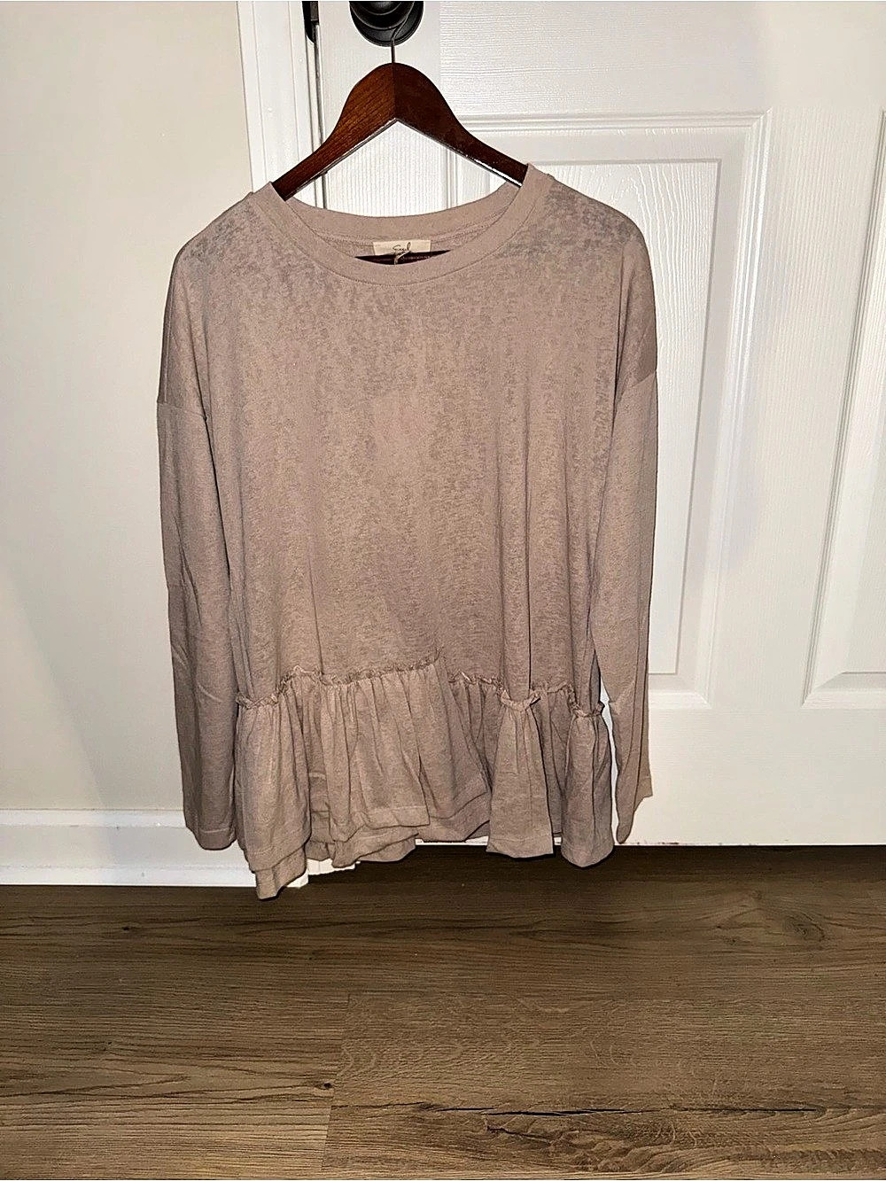 Easel Long Sleeve Ruffle Hem Top in Light Brown